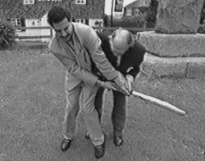 Borat learning the art of cricket
